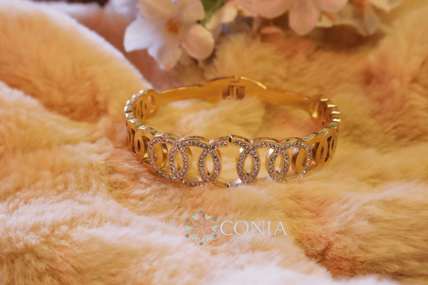 Women Gold-Plated American Diamond Bangle-Style Bracelet BRK55C001-2